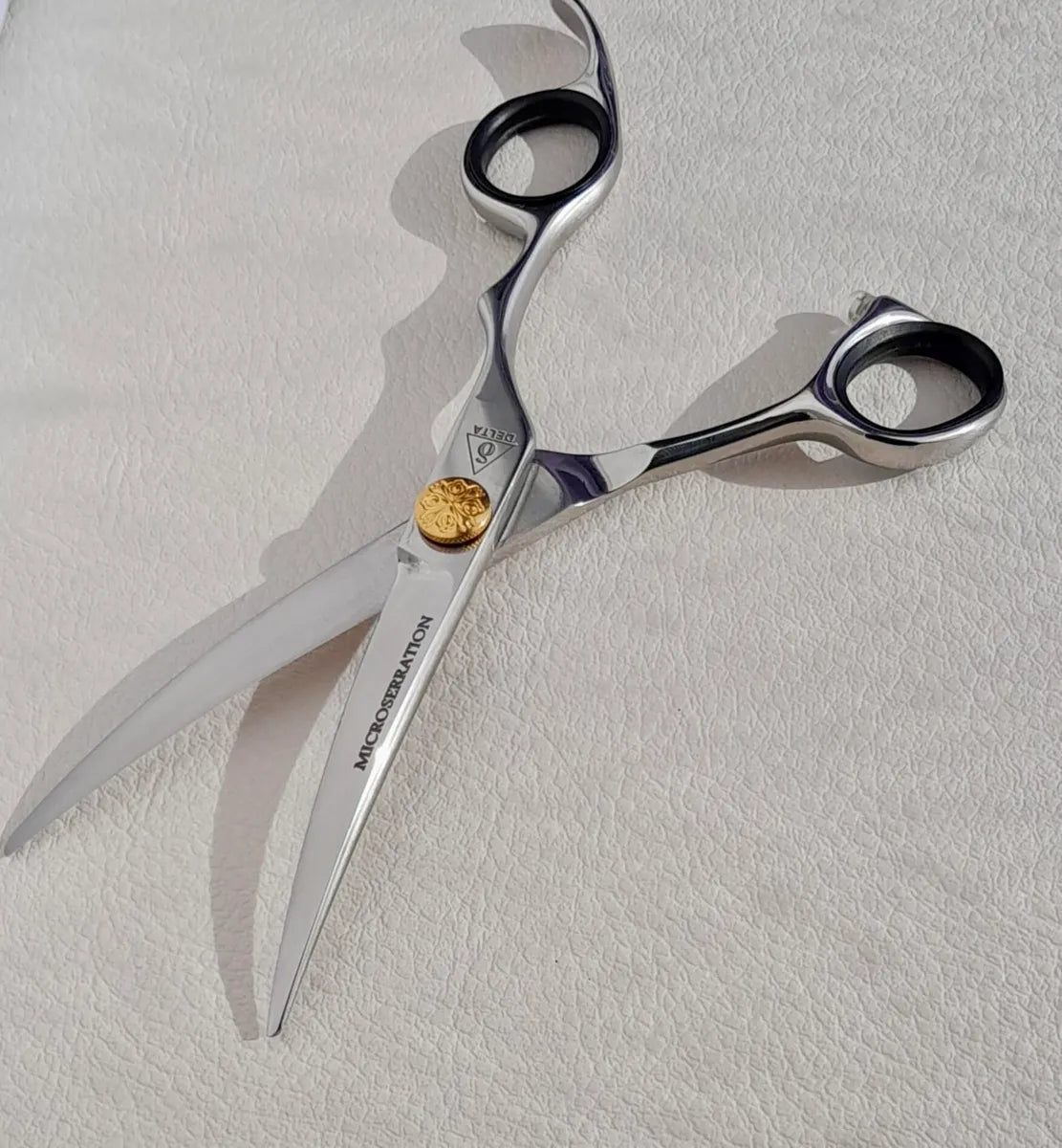 Delta Asian Curve 6-inch dog grooming scissor with micro serration blades open